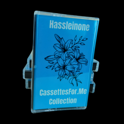 A blue cassette tape of the band Hassleinone